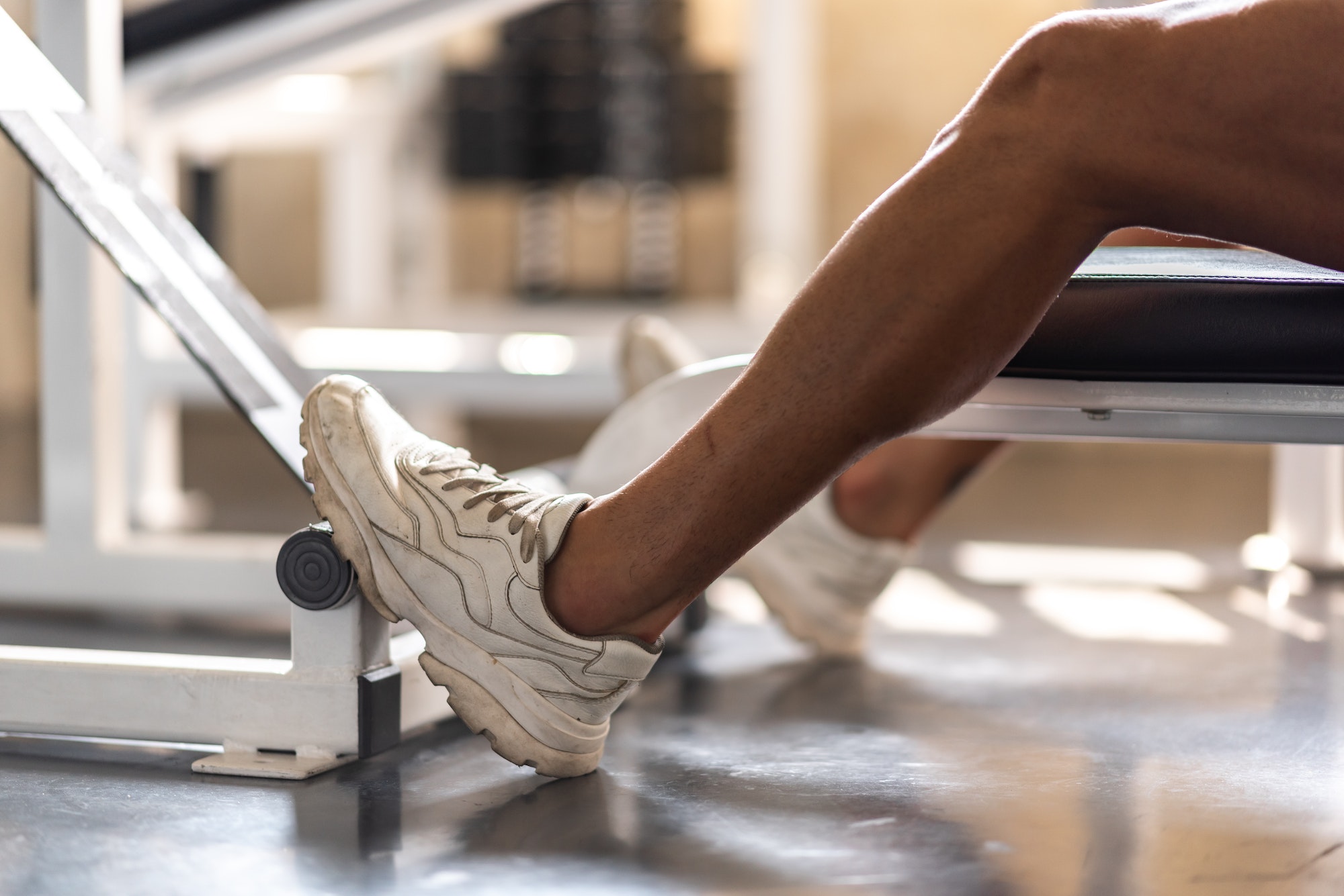 strong man exercising in the sport gym, workout exercise training in fitness for body strong